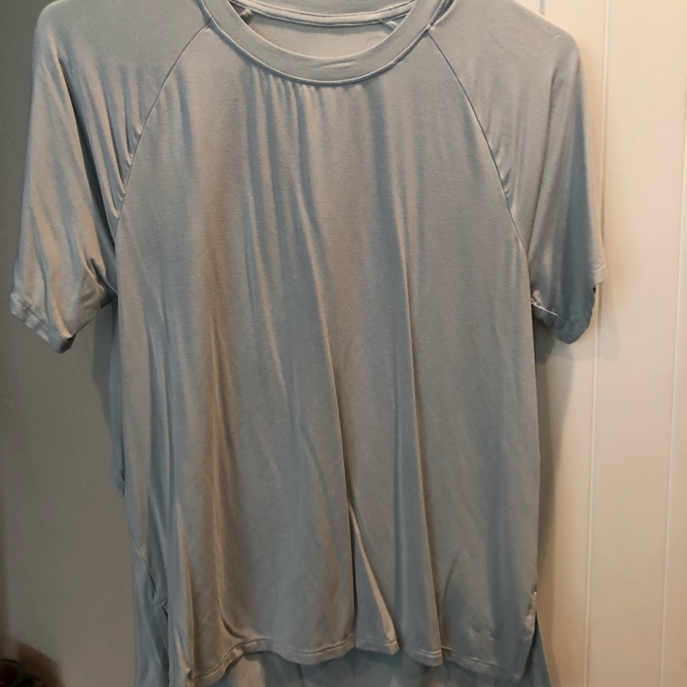 UA high low split back top